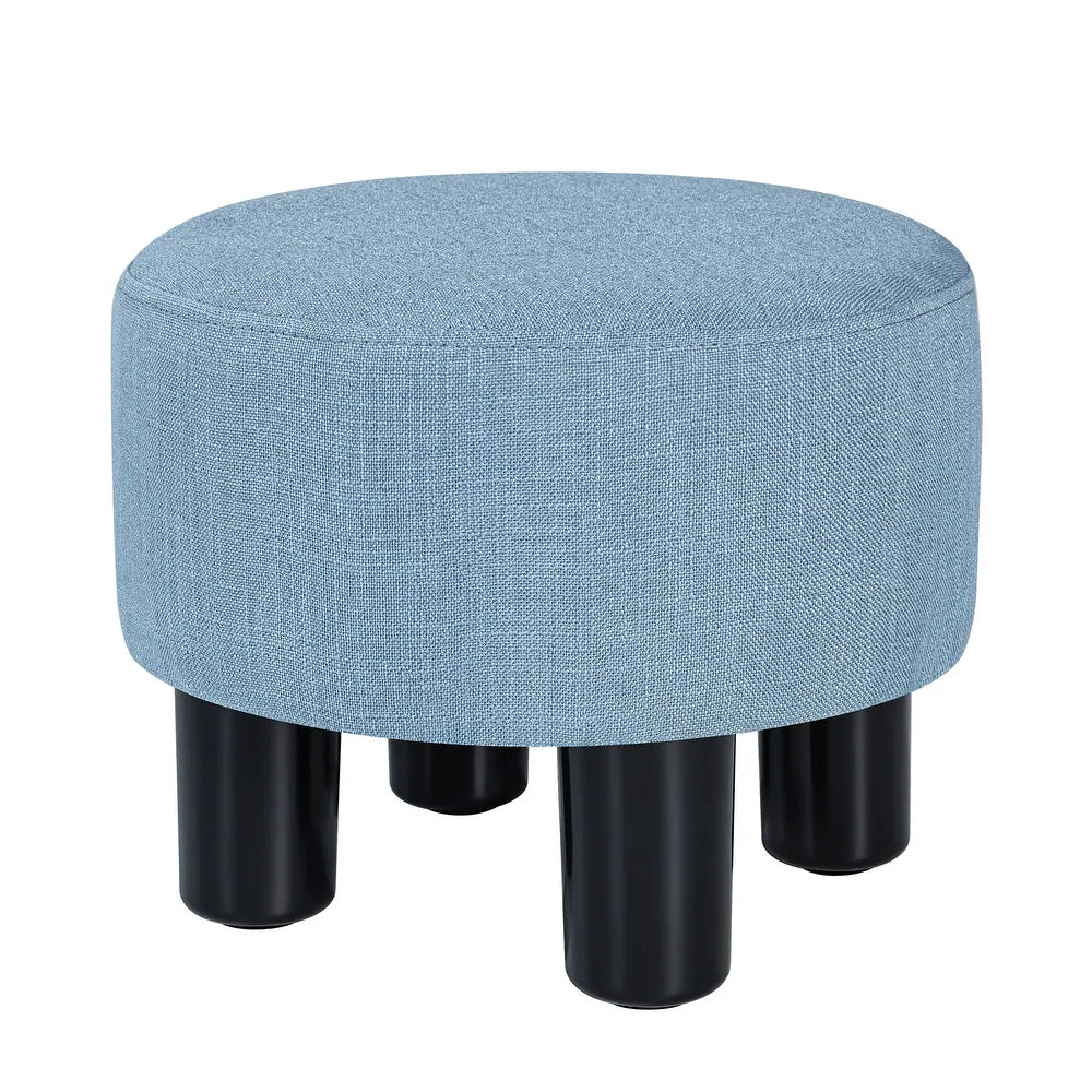Runder gepolsterter Stoffhocker